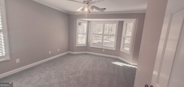 1030 Lake Haynes Dr NE, Conyers, GA 30012 - empty room featuring a ceiling fan, baseboards, crown molding, and carpet flooring