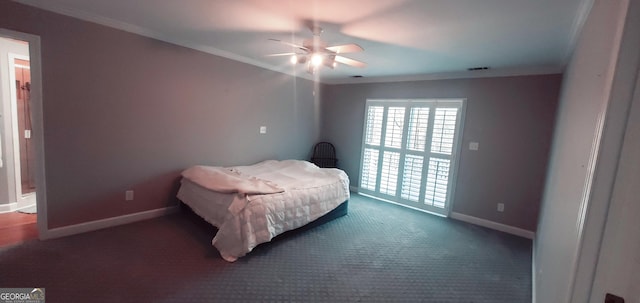 bedroom featuring ceiling fan, dark carpet, and ornamental molding