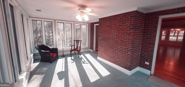 1030 Lake Haynes Dr NE, Conyers, GA 30012 - sunroom / solarium featuring brick wall, french doors, carpet flooring, and ornamental molding