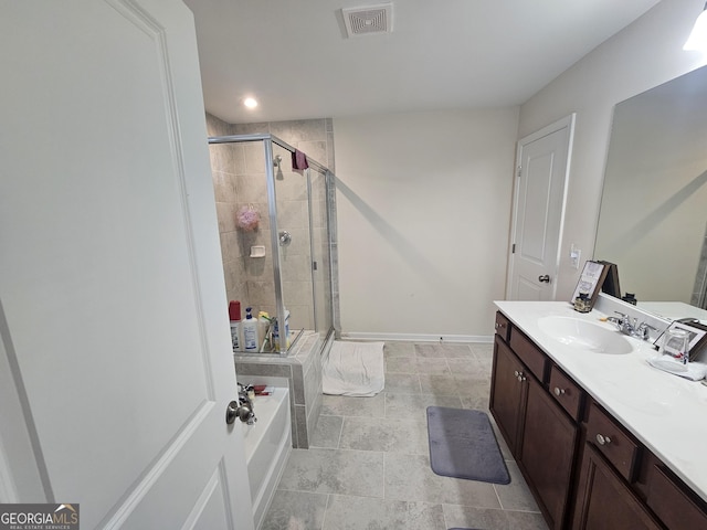 bathroom with vanity and plus walk in shower