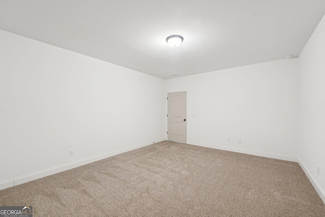 spare room with carpet flooring