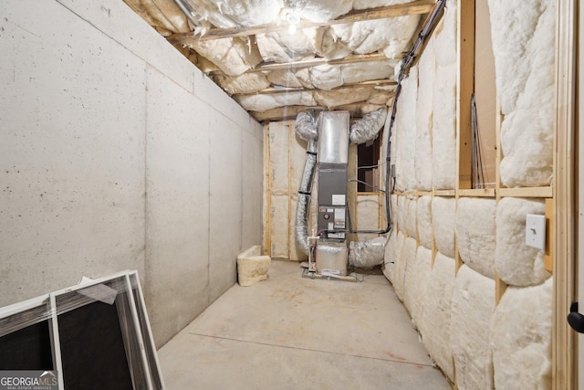 basement featuring heating unit