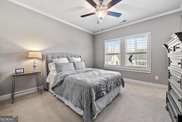 bedroom with light carpet, ceiling fan, and ornamental molding