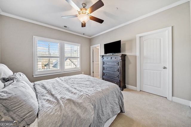 bedroom featuring light colored carpet, ceiling fan, and crown molding