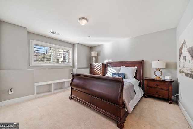 bedroom with light carpet