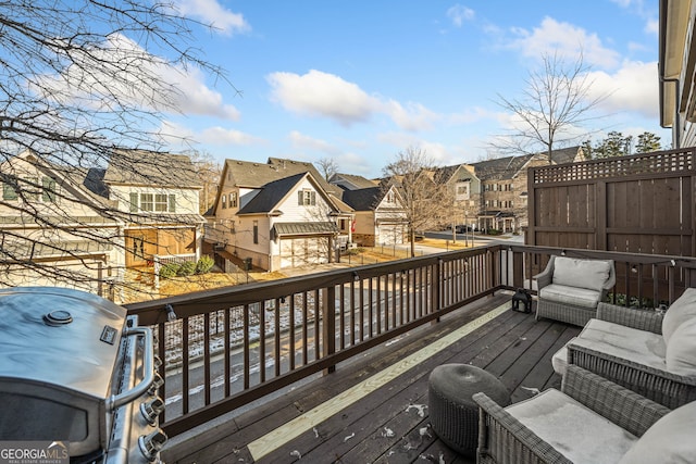 wooden terrace featuring grilling area