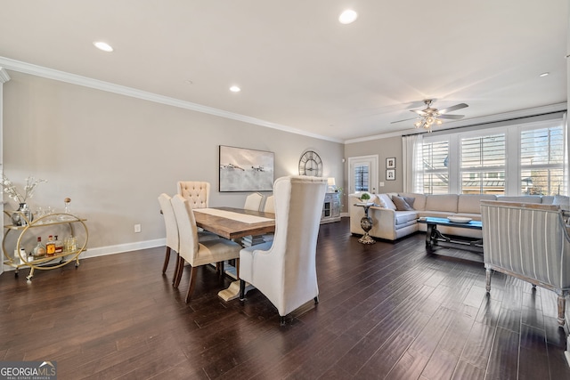 dining area with ornamental molding, dark hardwood / wood-style flooring, and ceiling fan