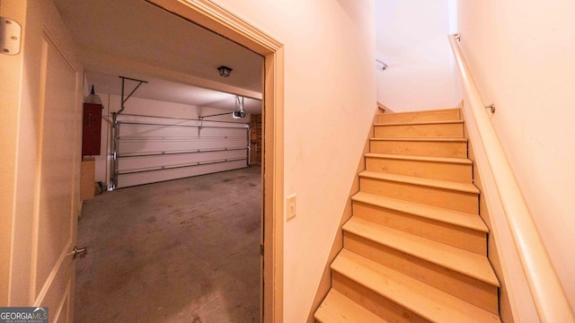 stairway with concrete floors