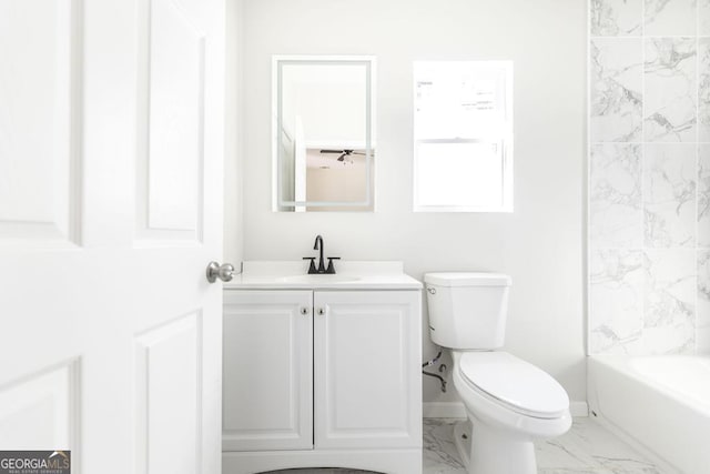 full bathroom featuring toilet, shower / washtub combination, and vanity