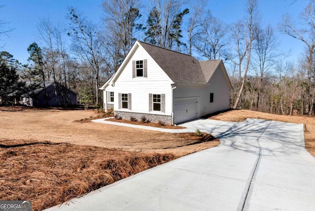 view of front of home with a garage