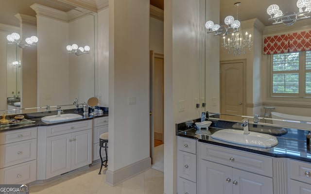 bathroom featuring tile patterned floors, vanity, and crown molding