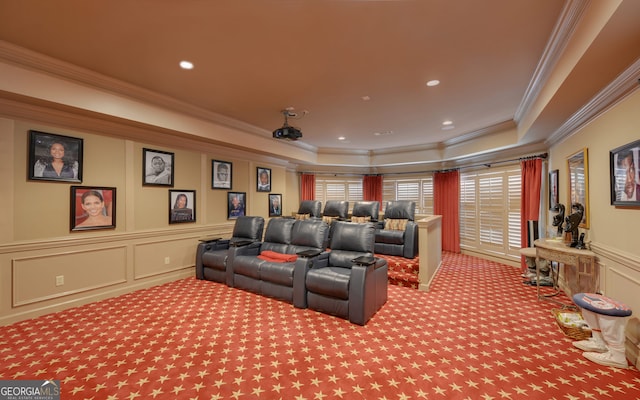 home theater with carpet flooring and ornamental molding