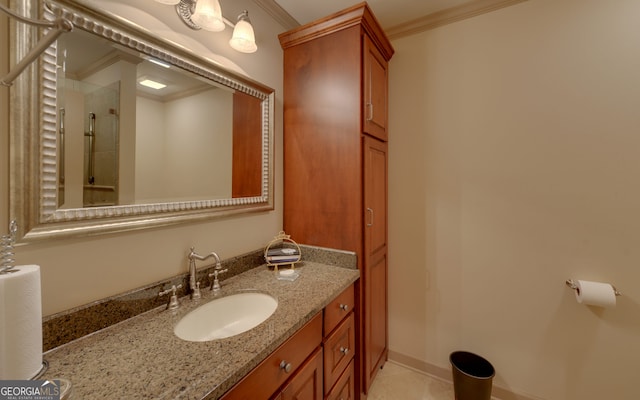 bathroom featuring vanity, tile patterned floors, walk in shower, and ornamental molding