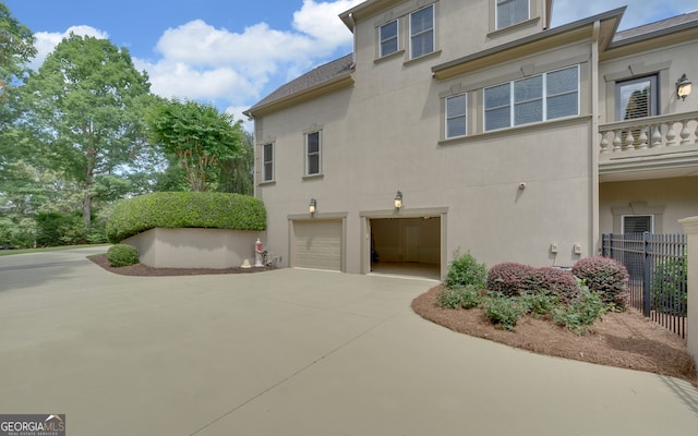 view of property exterior featuring a garage