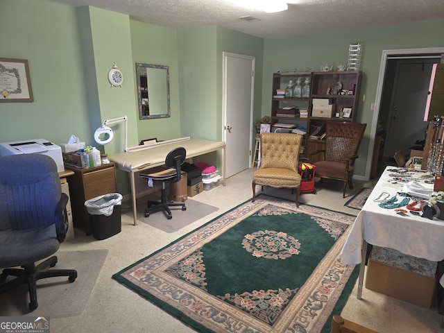 office space featuring a textured ceiling