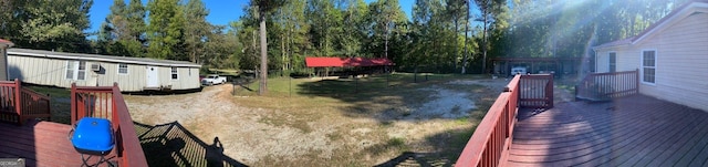 view of yard with a deck