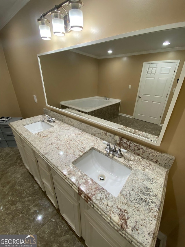 bathroom featuring ornamental molding and vanity