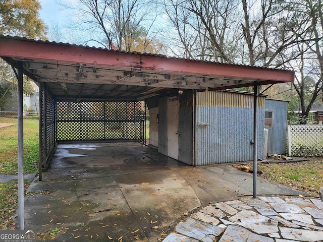 view of patio / terrace with a carport