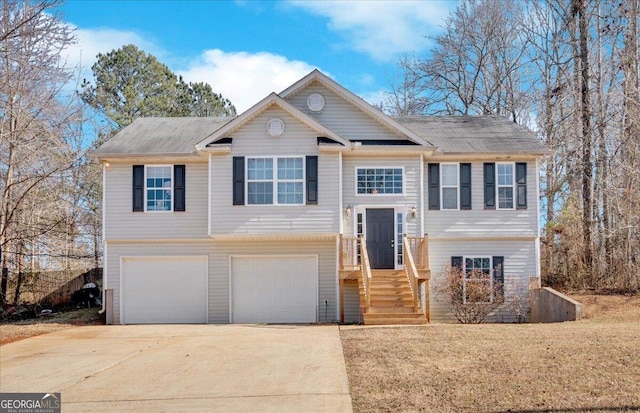 raised ranch featuring a garage