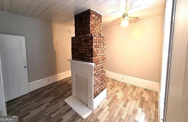 basement featuring ceiling fan, baseboards, wood finished floors, and wooden ceiling