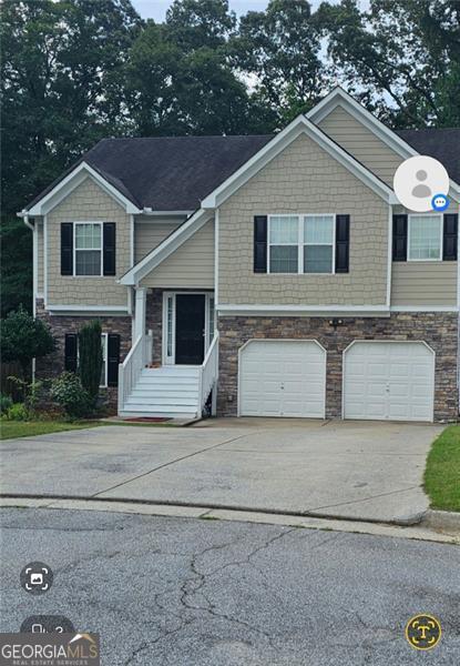 view of front of house with a garage