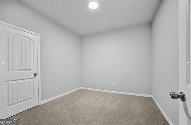 empty room featuring carpet floors