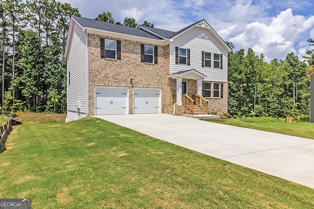 view of front of house featuring a garage and a front yard