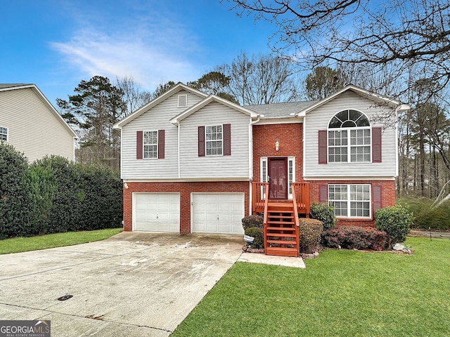 bi-level home featuring a front yard and a garage