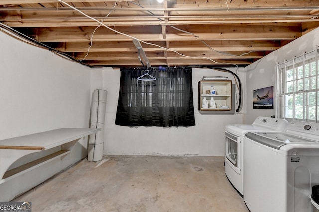 laundry room featuring separate washer and dryer