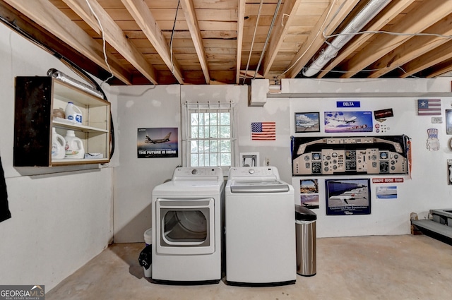 washroom with washer and clothes dryer