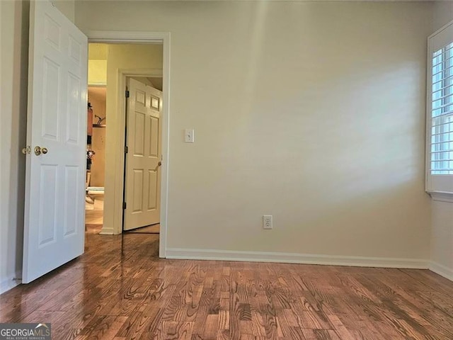 living area featuring ceiling fan, lofted ceiling, hardwood / wood-style floors, and a fireplace