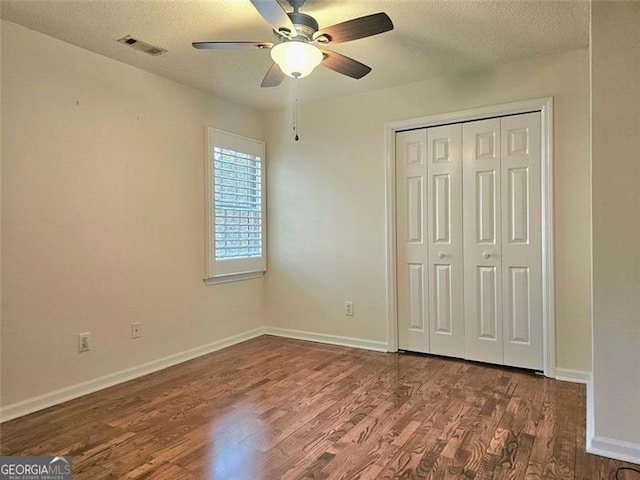 spare room with wood-type flooring