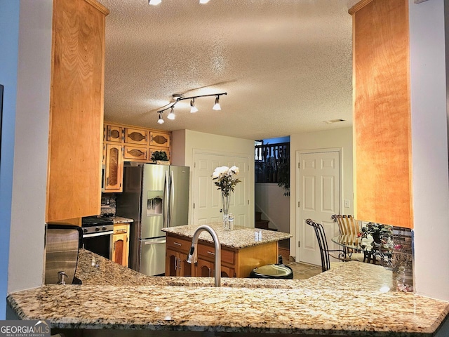 living room featuring ceiling fan, lofted ceiling, dark hardwood / wood-style flooring, and a textured ceiling