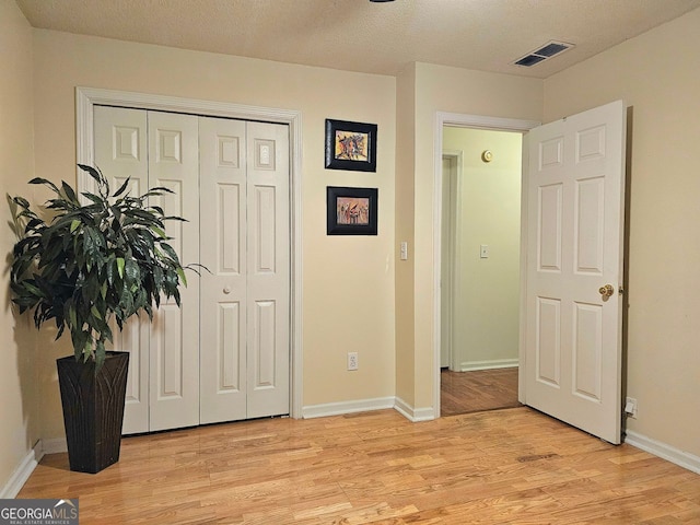 interior space with dark hardwood / wood-style flooring