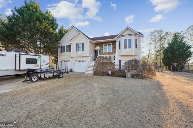 bi-level home featuring a garage