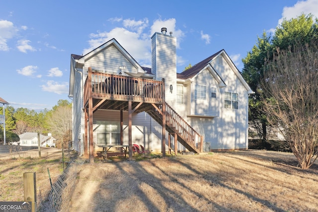 rear view of house with a deck