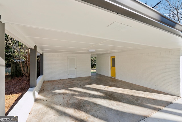 garage featuring a carport