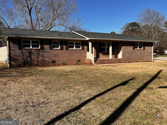 ranch-style house with a front lawn