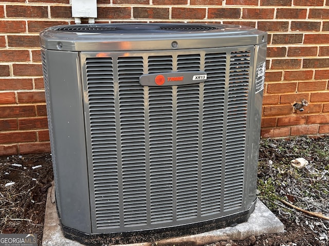 exterior details featuring cooling unit