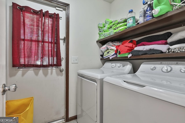 laundry room with independent washer and dryer