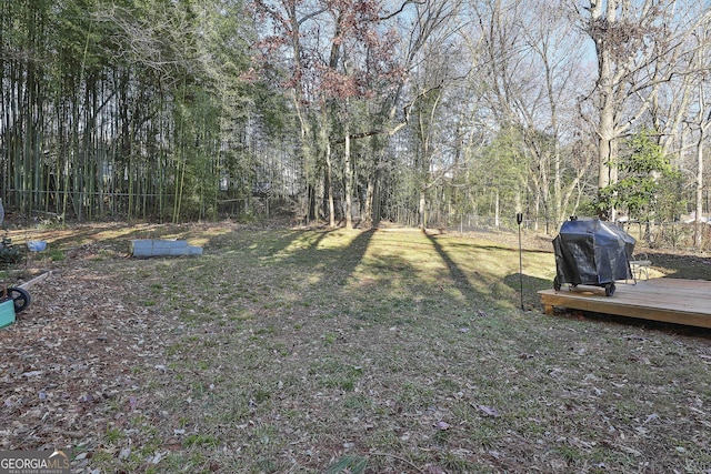 view of yard with a deck