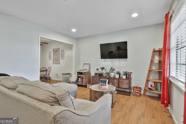 living room with light hardwood / wood-style flooring