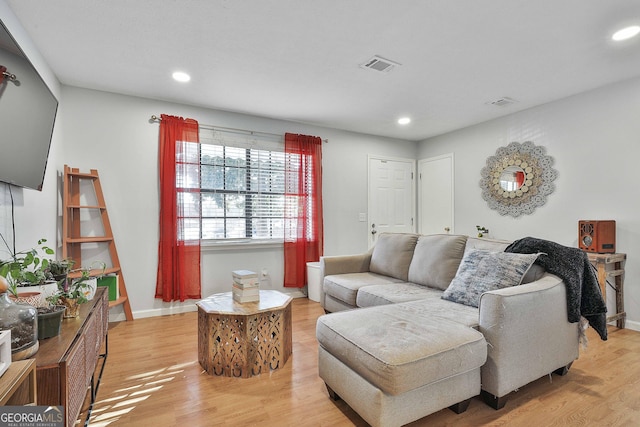 living room with light wood-type flooring