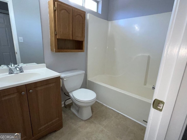 full bathroom with shower / tub combination, vanity, and toilet