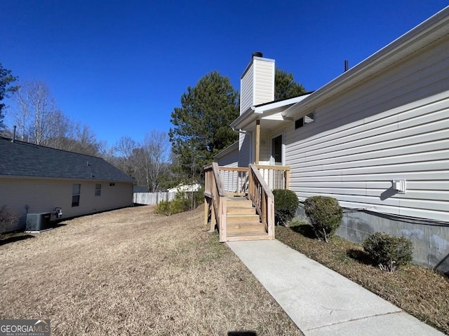 view of yard featuring central AC