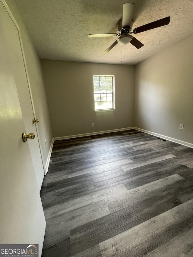 interior space with french doors, light tile patterned floors, and a textured ceiling