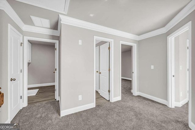 unfurnished bedroom with carpet and ornamental molding