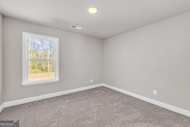 view of carpeted spare room