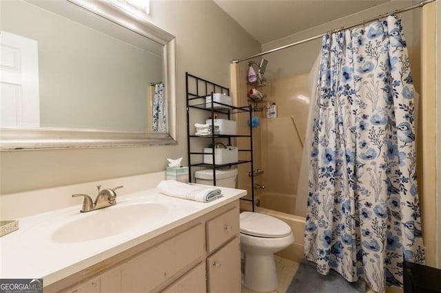 full bathroom with vanity, toilet, and shower / bath combo with shower curtain