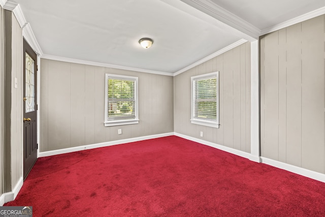 unfurnished bedroom with carpet flooring and crown molding